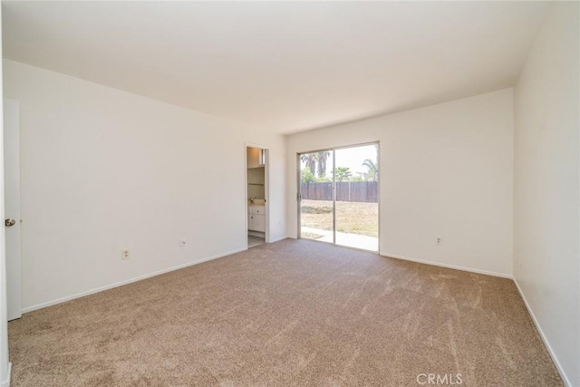 23607 Dracaea Ave, Moreno Valley, CA 92553 - spare room featuring carpet flooring and baseboards