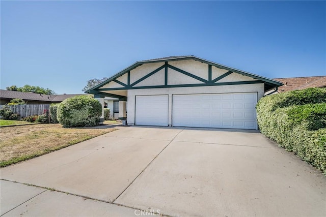 23607 Dracaea Ave, Moreno Valley, CA 92553 - view of front of house featuring stucco siding, driveway, and a garage