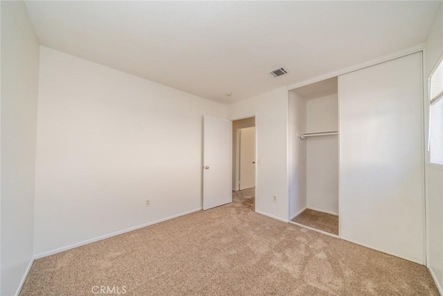23607 Dracaea Ave, Moreno Valley, CA 92553 - unfurnished bedroom featuring carpet, baseboards, and a closet