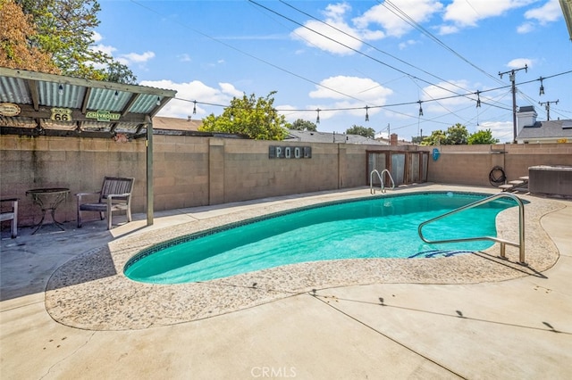 view of swimming pool with a fenced in pool, a patio area, central AC, and a fenced backyard