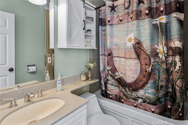 bathroom with toilet and vanity
