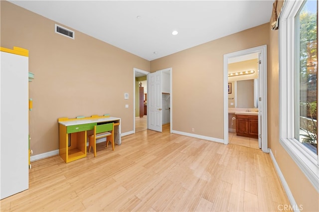 17265 Blue Spruce Ln, Yorba Linda, CA 92886 - bedroom featuring light wood-style flooring, baseboards, recessed lighting, a sink, and ensuite bathroom