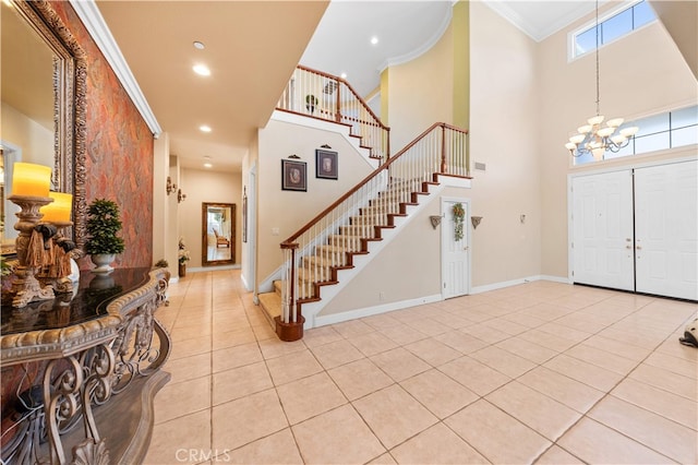 17265 Blue Spruce Ln, Yorba Linda, CA 92886 - tiled entryway featuring ornamental molding, stairs, a chandelier, a high ceiling, and baseboards