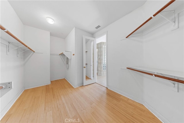 17265 Blue Spruce Ln, Yorba Linda, CA 92886 - spacious closet featuring wood finished floors