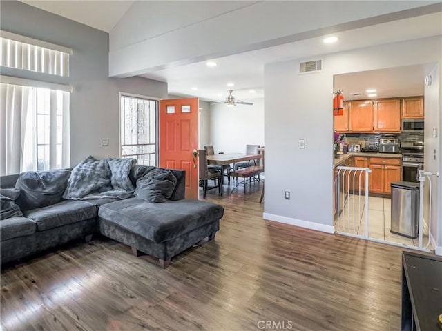 820 W Compton Blvd Unit 5, Compton, CA 90220 - living area featuring ceiling fan, light wood finished floors, baseboards, recessed lighting, and high vaulted ceiling