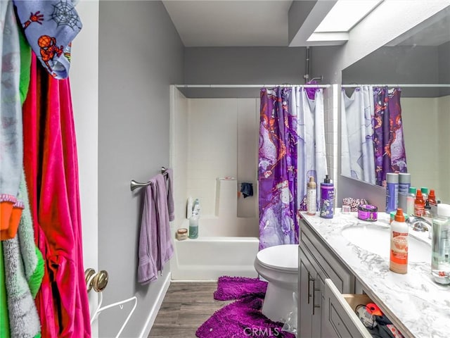 820 W Compton Blvd Unit 5, Compton, CA 90220 - full bath with wood finished floors, toilet, vanity, and shower / bath combo