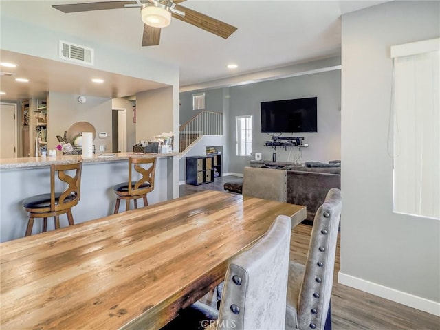 820 W Compton Blvd Unit 5, Compton, CA 90220 - dining area featuring ceiling fan, wood finished floors, baseboards, stairs, and recessed lighting