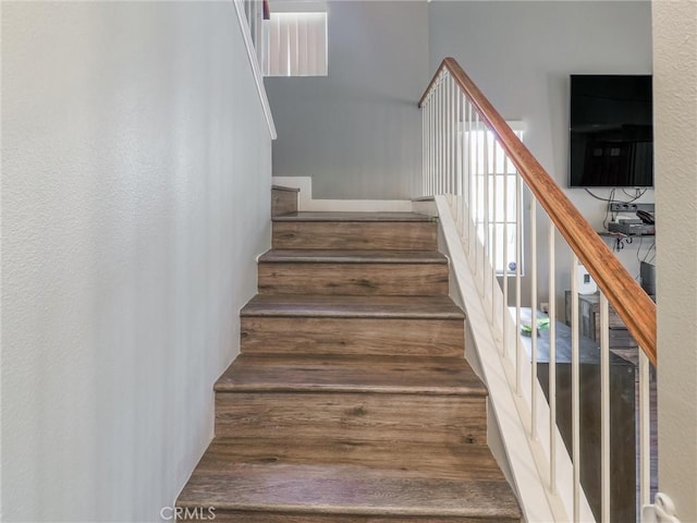 820 W Compton Blvd Unit 5, Compton, CA 90220 - stairs with wood finished floors and a high ceiling