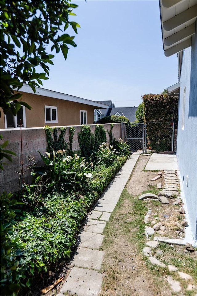 view of yard featuring fence