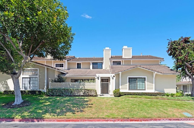 3906 Caminito Del Mar Surf, San Diego, CA 92130 - traditional-style home with a chimney and a front lawn