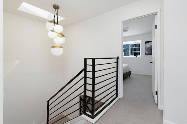 3906 Caminito Del Mar Surf, San Diego, CA 92130 - stairway with a skylight and carpet