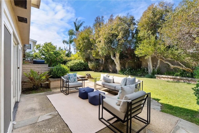 view of patio / terrace with an outdoor living space and fence private yard