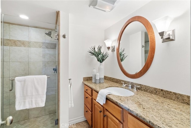 full bath featuring vanity and a stall shower