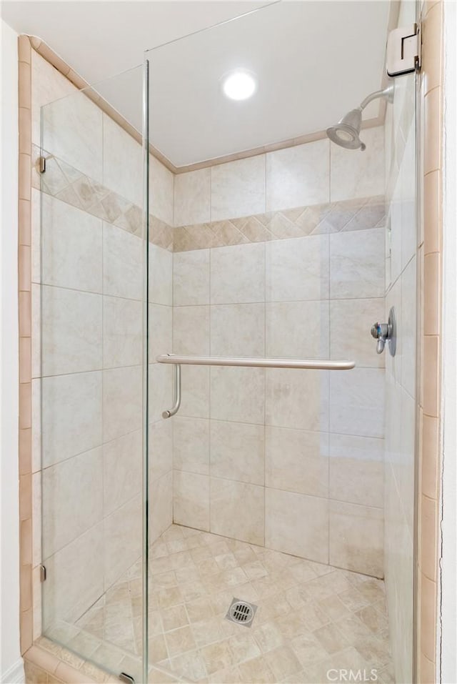 full bathroom with a stall shower
