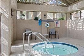 2327 Archwood Ln Unit 125, Simi Valley, CA 93063 - view of swimming pool featuring an indoor hot tub