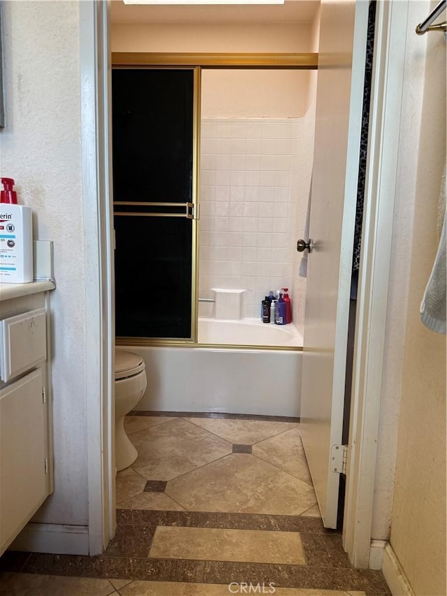 full bathroom featuring toilet and  shower combination