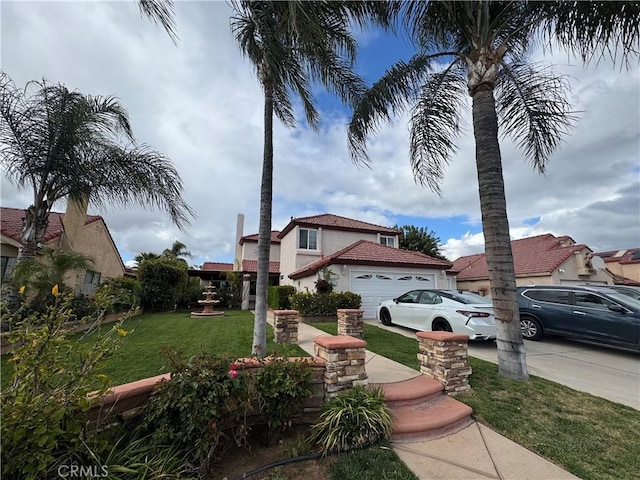 view of front of house featuring stucco siding, concrete driveway, a front lawn, and a garage