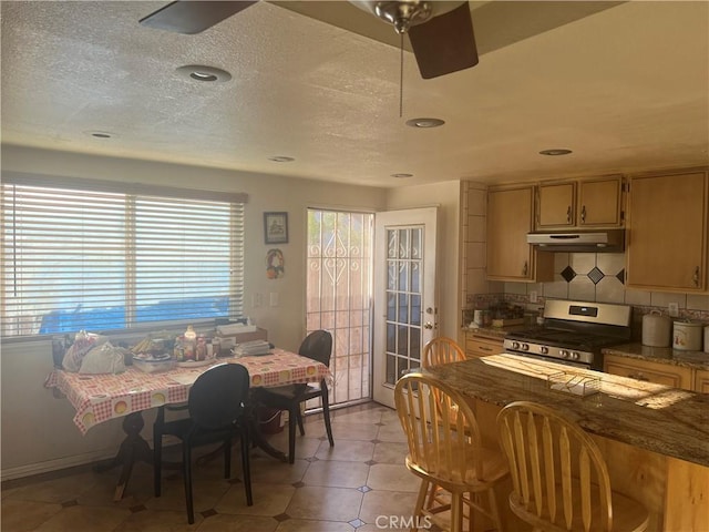 23680 Rhea Dr, Moreno Valley, CA 92557 - dining room with a textured ceiling, a ceiling fan, and recessed lighting
