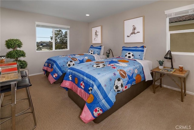 carpeted bedroom with baseboards and recessed lighting