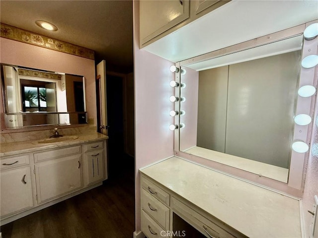 851 Ronda Mendoza Unit B, Laguna Woods, CA 92637 - bathroom featuring wood finished floors and vanity