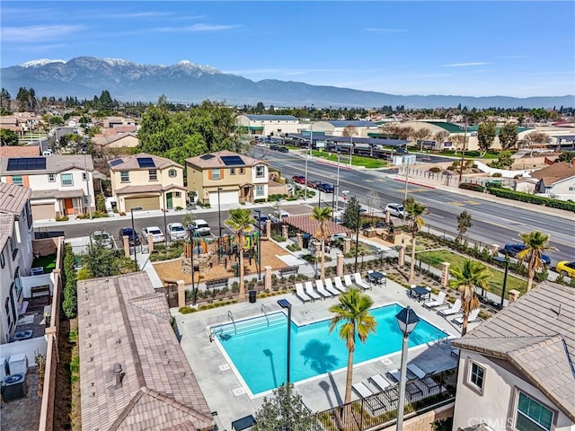 drone / aerial view featuring a mountain view