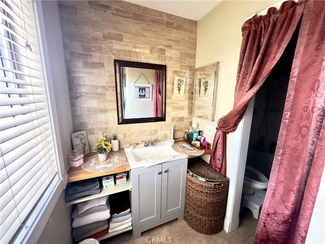 15696 Patricia St, Moreno Valley, CA 92551 - bathroom with tile patterned floors, vanity, and toilet