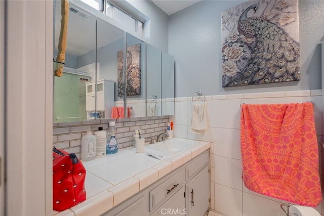 5111 W W Ave M2, Lancaster, CA 93536 - bathroom with vanity, tile walls, and wainscoting