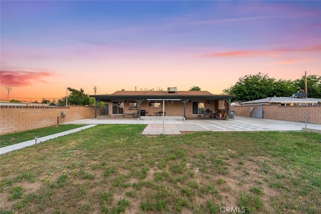 5111 W W Ave M2, Lancaster, CA 93536 - rear view of house featuring a patio