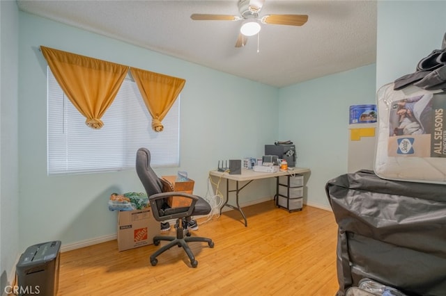 5111 W W Ave M2, Lancaster, CA 93536 - office with wood finished floors, a ceiling fan, a textured ceiling, and baseboards