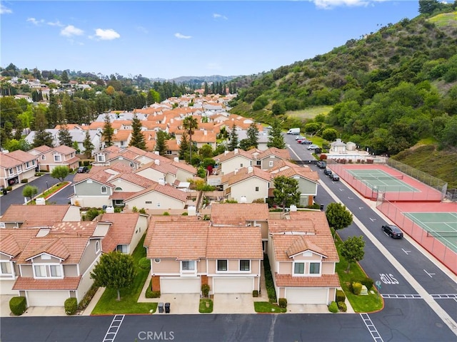 aerial view with a mountain view and a residential view