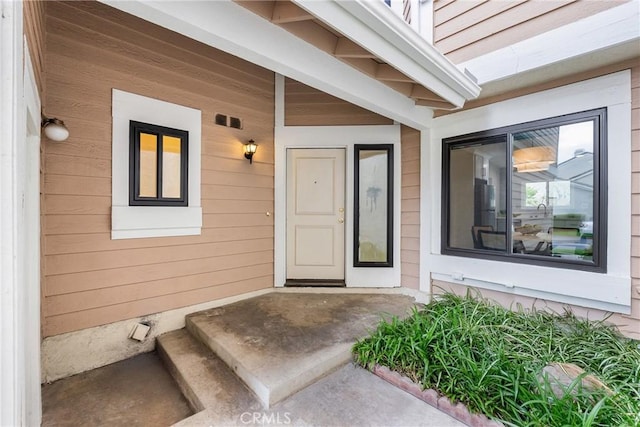 property entrance featuring covered porch
