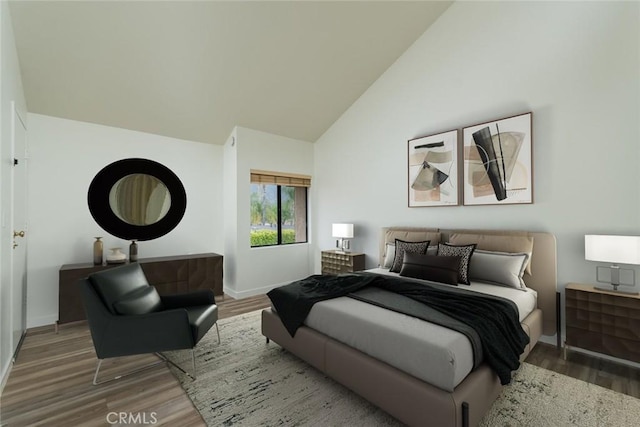 527 E Elmwood Ave Unit E, Burbank, CA 91501 - bedroom with wood finished floors, high vaulted ceiling, and baseboards