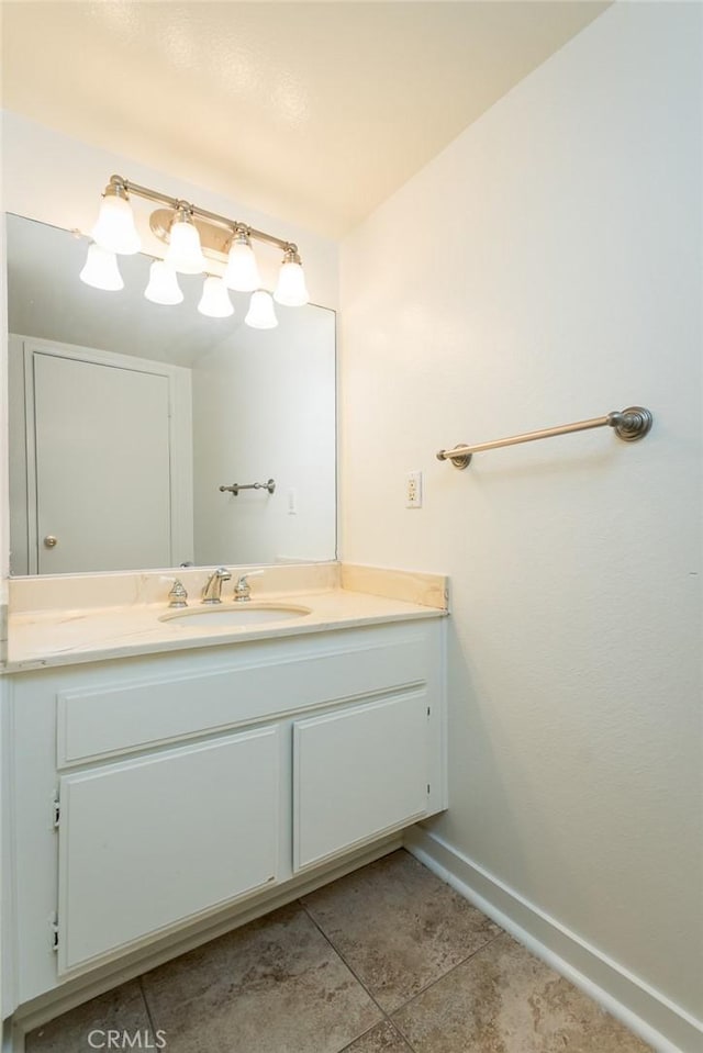 527 E Elmwood Ave Unit E, Burbank, CA 91501 - bathroom featuring vanity, tile patterned floors, and baseboards