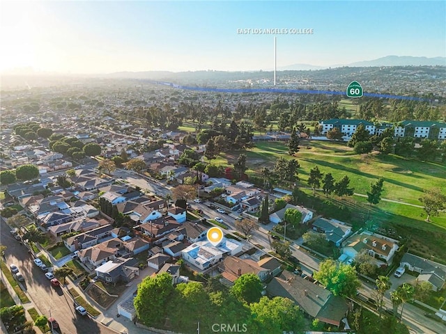aerial view featuring a mountain view and a residential view