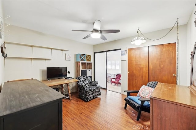 office space featuring a ceiling fan and wood finished floors