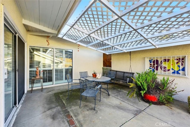 view of patio featuring outdoor dining space