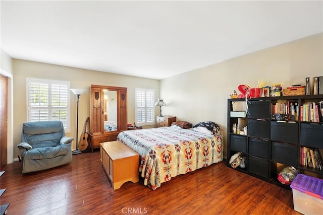 bedroom featuring wood finished floors