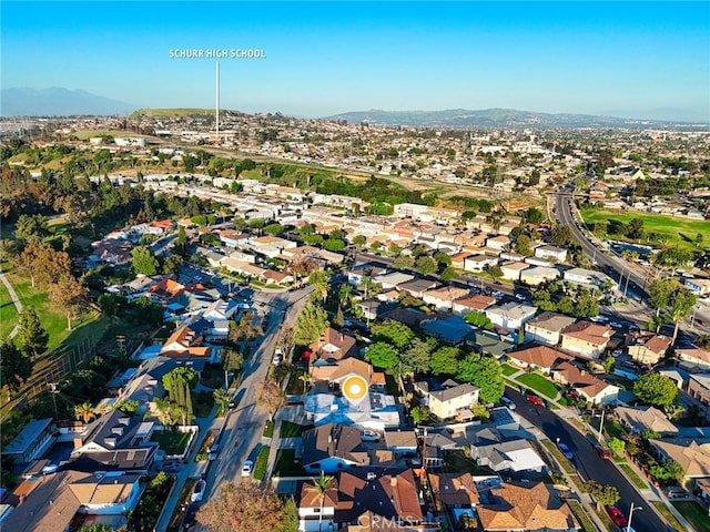aerial view with a mountain view and a residential view