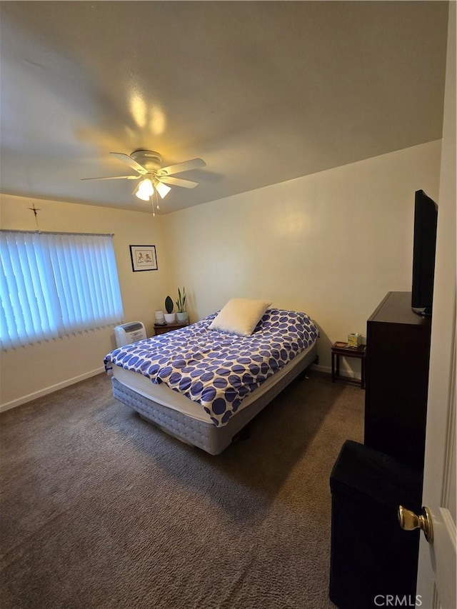 bedroom with baseboards, carpet, and ceiling fan