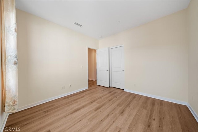 111 Messenger, Irvine, CA 92618 - unfurnished room with visible vents, baseboards, and wood finished floors