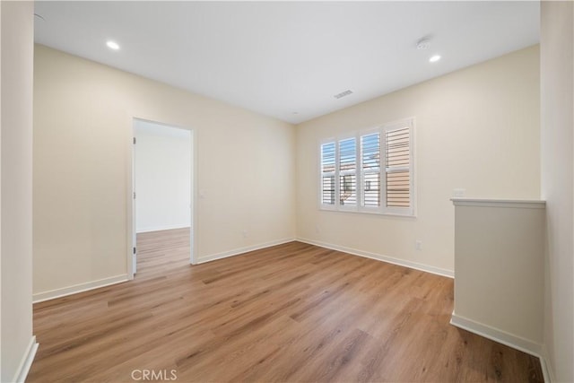 111 Messenger, Irvine, CA 92618 - spare room featuring recessed lighting, light wood-style floors, visible vents, and baseboards
