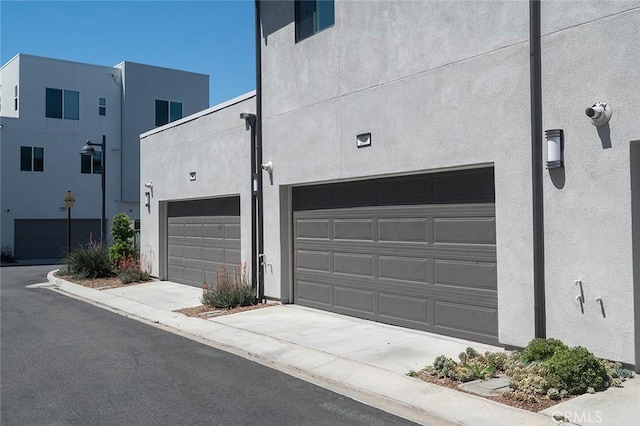 208 Novel, Irvine, CA 92618 - garage featuring concrete driveway