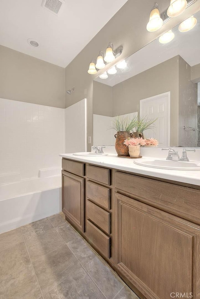 44936 Honey Locust Dr, Temecula, CA 92592 - full bath featuring tile patterned flooring, double vanity, a sink, and visible vents