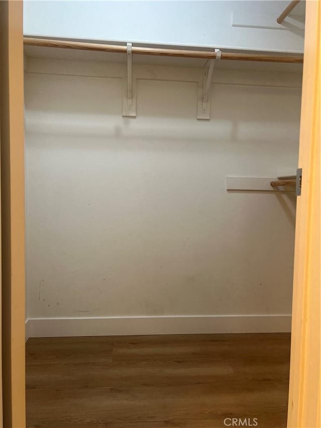 44936 Honey Locust Dr, Temecula, CA 92592 - walk in closet featuring wood finished floors