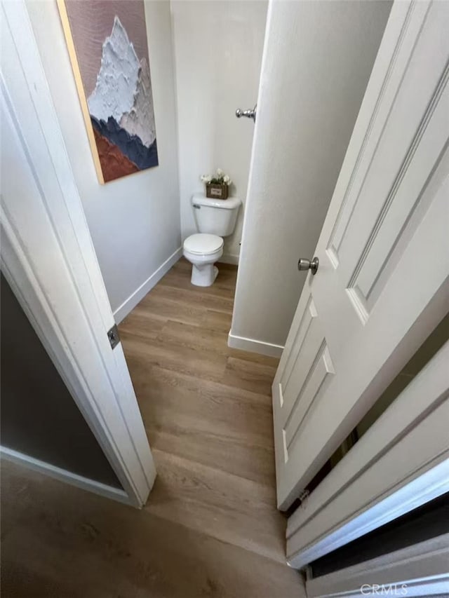 44936 Honey Locust Dr, Temecula, CA 92592 - interior space with toilet, wood finished floors, and baseboards