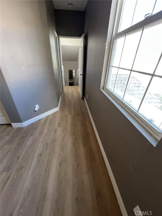 44936 Honey Locust Dr, Temecula, CA 92592 - corridor with light wood-style flooring and baseboards