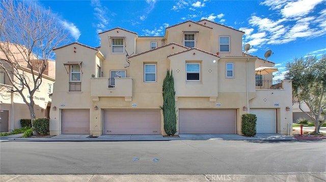 44936 Honey Locust Dr, Temecula, CA 92592 - townhome / multi-family property with a garage and stucco siding