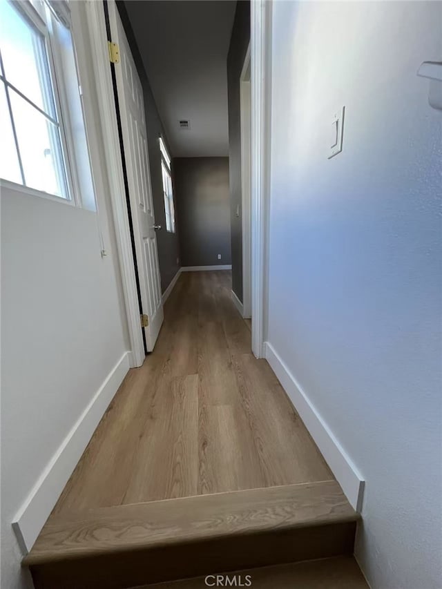 44936 Honey Locust Dr, Temecula, CA 92592 - hallway with light wood-type flooring and baseboards