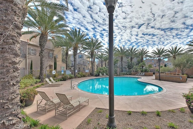 44936 Honey Locust Dr, Temecula, CA 92592 - pool with fence, a patio, and a residential view