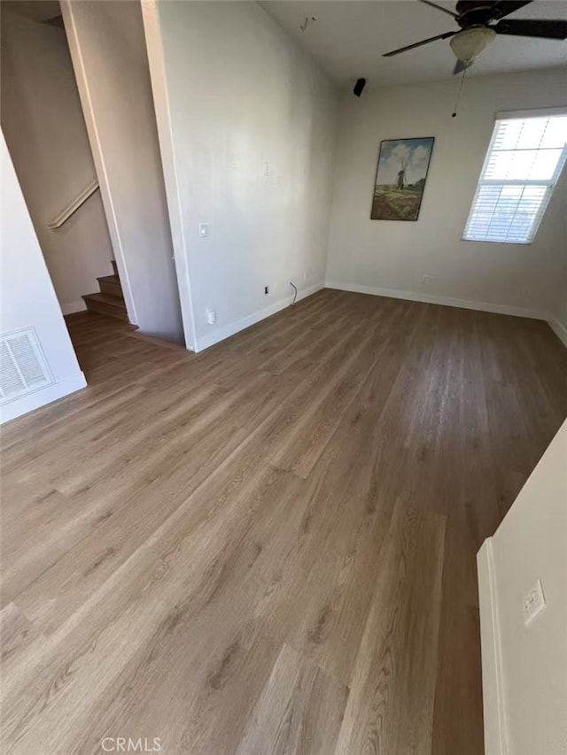 44936 Honey Locust Dr, Temecula, CA 92592 - interior space with wood finished floors, stairs, baseboards, visible vents, and a ceiling fan